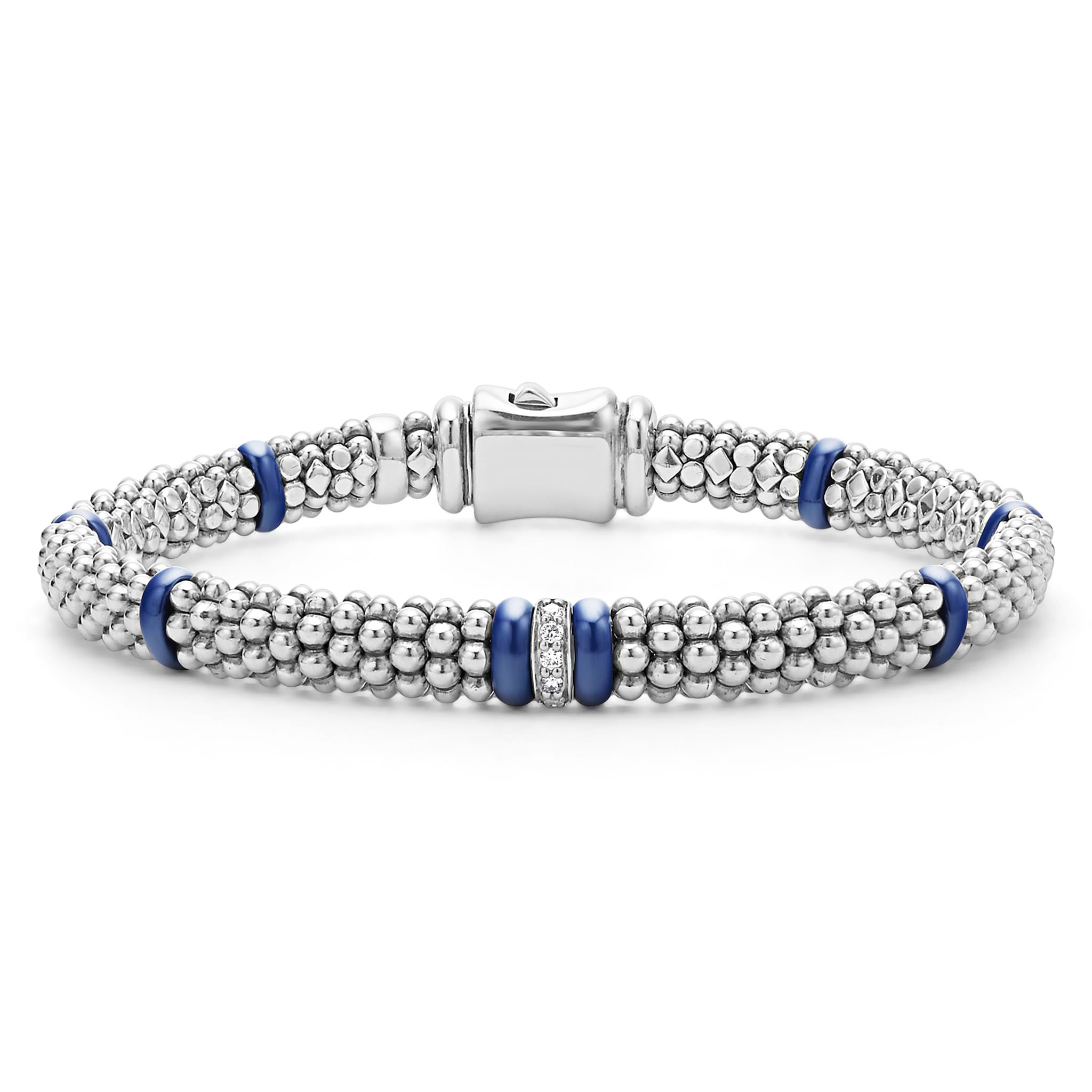 A single diamond station set in sterling silver surrounded by ultramarine ceramic and Caviar beading. LAGOS diamonds are the highest quality natural stones.