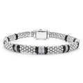 Four diamond station set in sterling silver surrounded by black ceramic and Caviar beading. LAGOS diamonds are the highest quality natural stones.