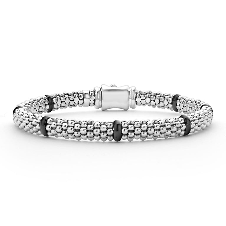 Seven smooth black ceramic stations highlight sterling silver Caviar beading on this signature bracelet.