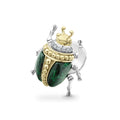 A LAGOS exclusive. Jade with diamond, 18K gold and sterling silver accents forming a beetle pin. Ideal to pair with other signature Rare Wonder designs.