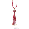 A LAGOS exclusive. A ruby gemstone necklace and ruby gemstone tassel pendant with 18K gold Caviar beading form this pendant necklace.
