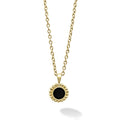 Round onyx pendant necklace that is set and surrounded by 18K gold Caviar beading.