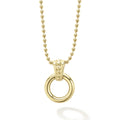 An 18k gold circle with a Caviar beaded accent forms this pendant on a gold necklace.