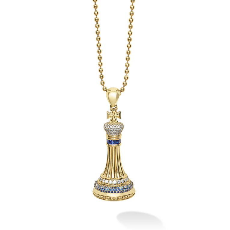 A LAGOS exclusive. Beautifully crafted 18k gold king chess piece accented with precious blue sapphires and diamonds. LAGOS diamonds are the highest quality natural stones.