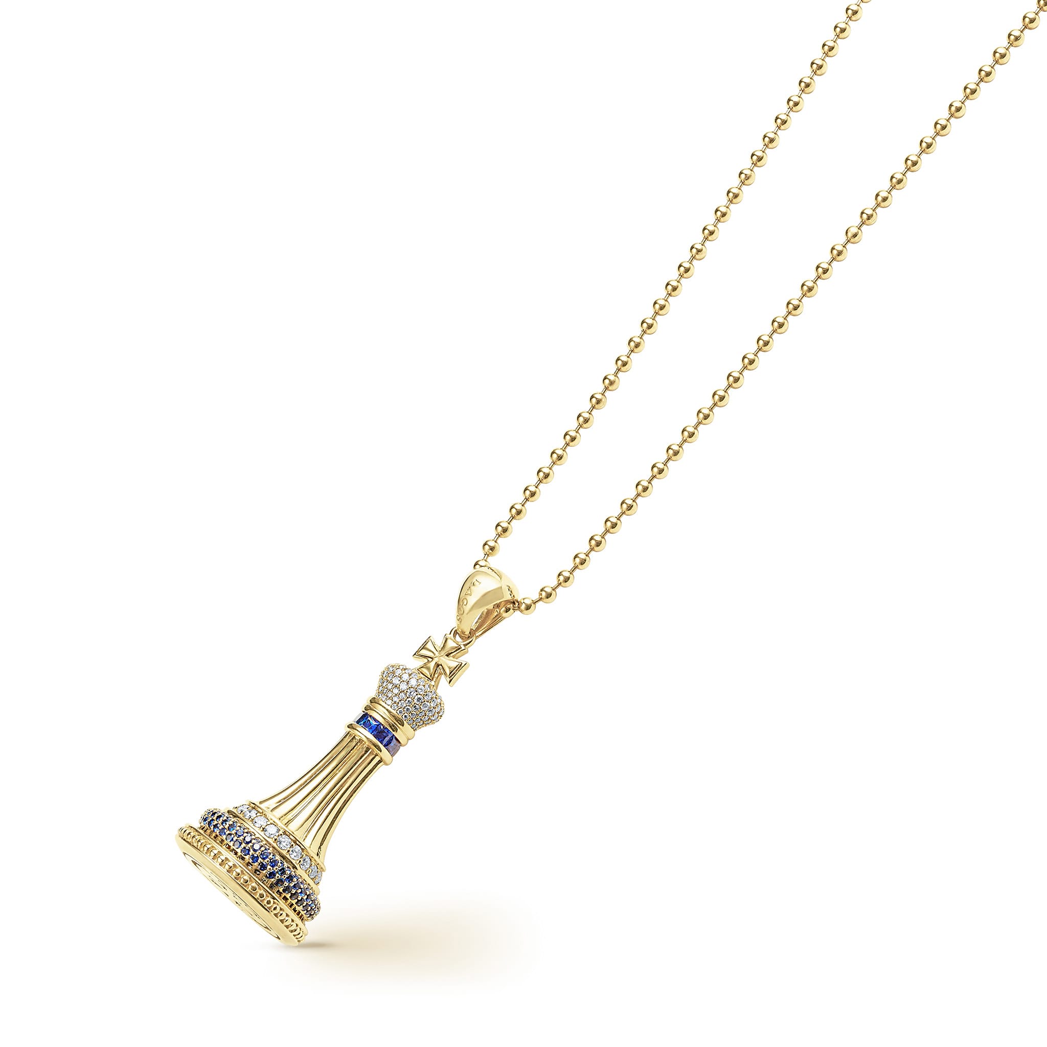 Rare Wonders Blue Sapphire and Diamond King Pendant Necklace features an 18K gold tassel-style pendant with blue sapphires and diamonds on a ball-chain necklace.