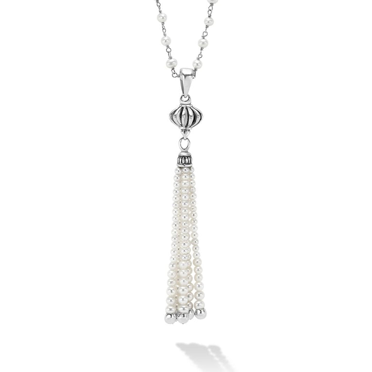 A best-selling LAGOS design. This pearl beaded necklace and tassel pendant are great for layering or worn in a single strand.