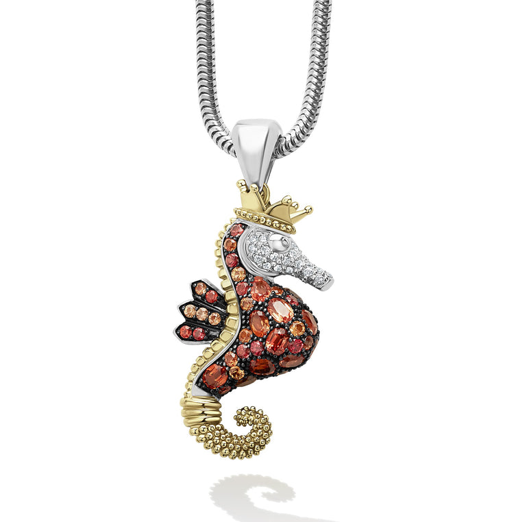 A LAGOS exclusive. Beautifully crafted seahorse of sterling silver and 18K gold highlighted with precious orange sapphires and diamonds. LAGOS diamonds are the highest quality natural stones.