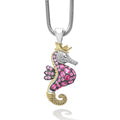A LAGOS exclusive. Beautifully crafted seahorse of sterling silver and 18K gold with precious pink sapphires and diamonds. LAGOS diamonds are the highest quality natural stones.