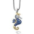 A LAGOS exclusive. Beautifully crafted seahorse of sterling silver and 18K gold with precious blue sapphires and diamonds. LAGOS diamonds are the highest quality natural stones.
