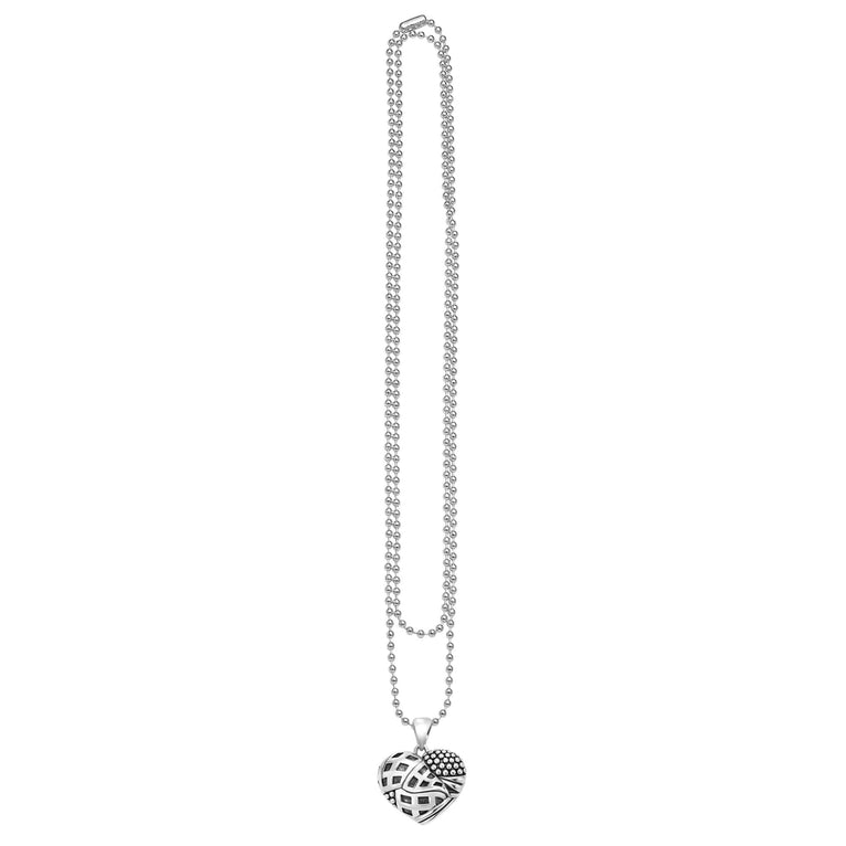 Keep Memory Alive Heart Pendant Necklace featuring a sterling silver chain with a split-texture heart pendant, inspired by Frank Gehry's Las Vegas architectural design.