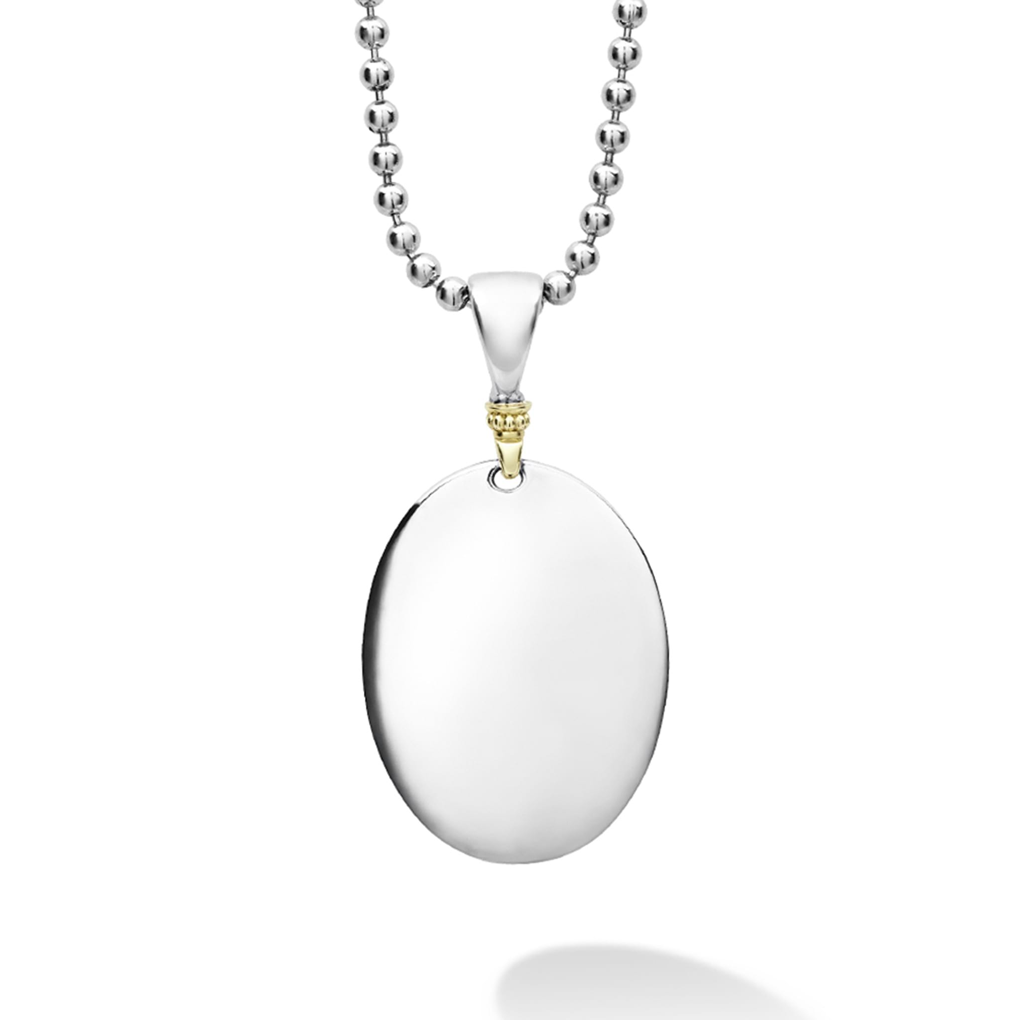 A LAGOS exclusive. Highly polished sterling silver oval necklace with 18K gold beading. Ideal for a modern initial or classic monogram.