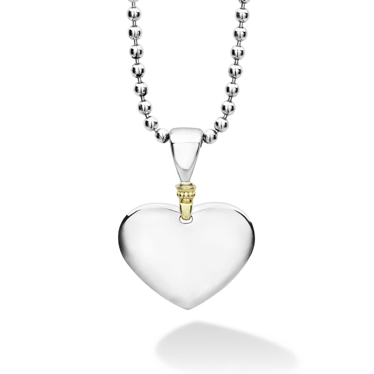 Beloved Heart Pendant Necklace: Sterling silver ball-chain with polished heart pendant, featuring 18K gold beading, showcasing LAGOS dedication to elegance and quality craftsmanship.