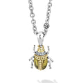 A LAGOS exclusive. Olive quartz with diamond, 18K gold and sterling silver accents forming a beetle pendant.