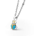 Rare Wonders Turquoise Beetle Diamond Pendant Necklace features a beetle-shaped pendant with turquoise, diamond accents, and two-tone metal details on a silver chain.