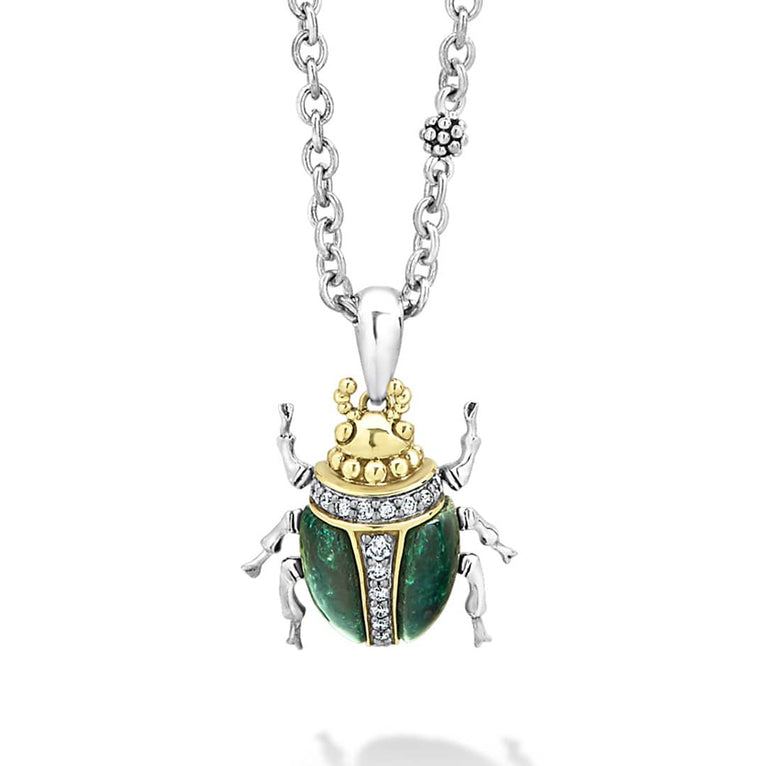 A LAGOS exclusive. Jade with diamond, 18K gold and sterling silver accents forming a beetle pendant finished on a versatile link necklace with six sterling silver Caviar beaded stations.
