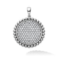 A pavé diamond statement circle pendant framed by sterling silver Caviar beading. LAGOS diamonds are the highest quality natural stones.