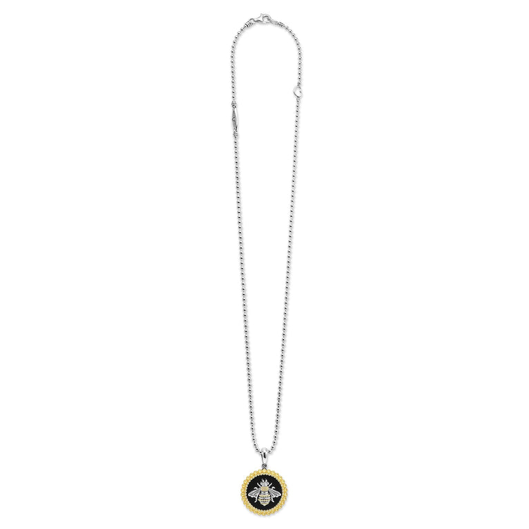 yellow mother-of-pearl honeybee on black onyx in the Rare Wonders Circle Pendant Necklace, showcasing intricate 18K gold Caviar beading
