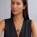 Rare Wonders Honeybee Circle Pendant Necklace worn on a model, demonstrating its style and size