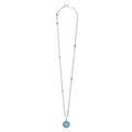 Maya Small Ceramic Circle Pendant Necklace with turquoise-blue stone framed by sterling silver Caviar beading on a silver-tone chain with beaded stations.