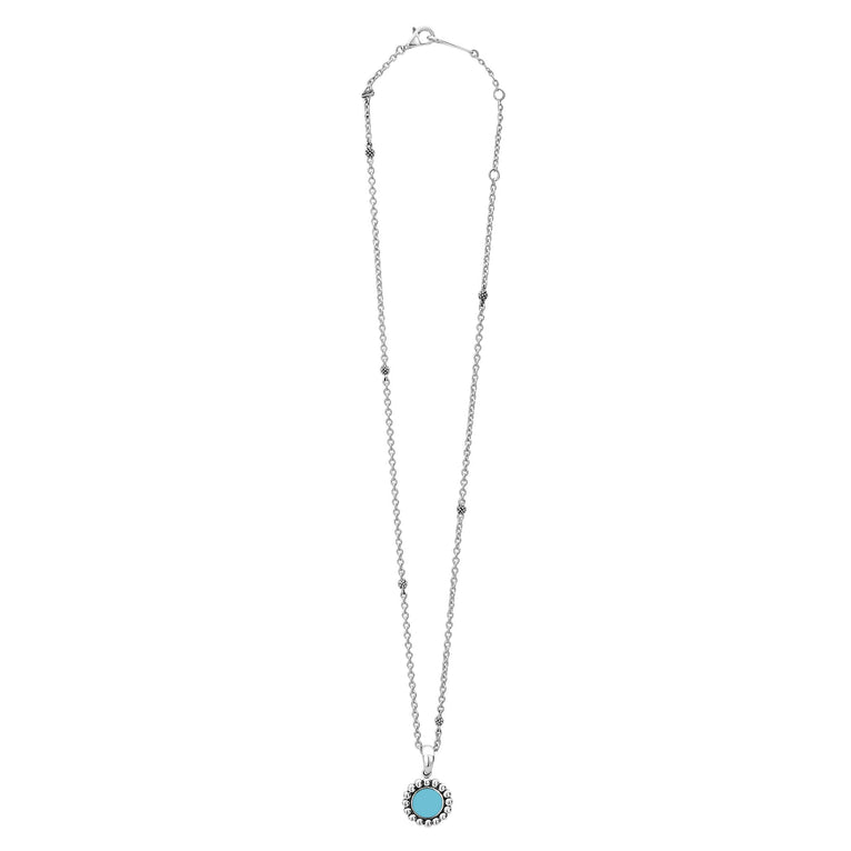 Maya Small Ceramic Circle Pendant Necklace with turquoise-blue stone framed by sterling silver Caviar beading on a silver-tone chain with beaded stations.
