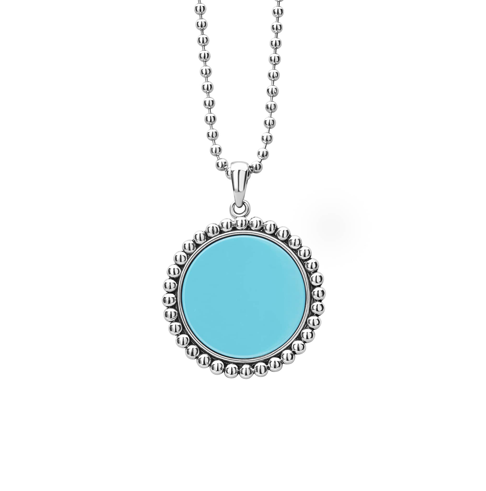 A blue ceramic pendant framed by sterling silver Caviar beading finsihed on a versatile ball chain necklace.