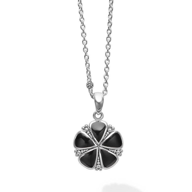 A LAGOS exclusive. An onyx flower pendant finished on a versatile link necklace with six sterling silver Caviar beaded stations.