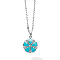 A LAGOS exclusive. A turquoise flower pendant finished on a versatile link necklace with six sterling silver Caviar beaded stations.