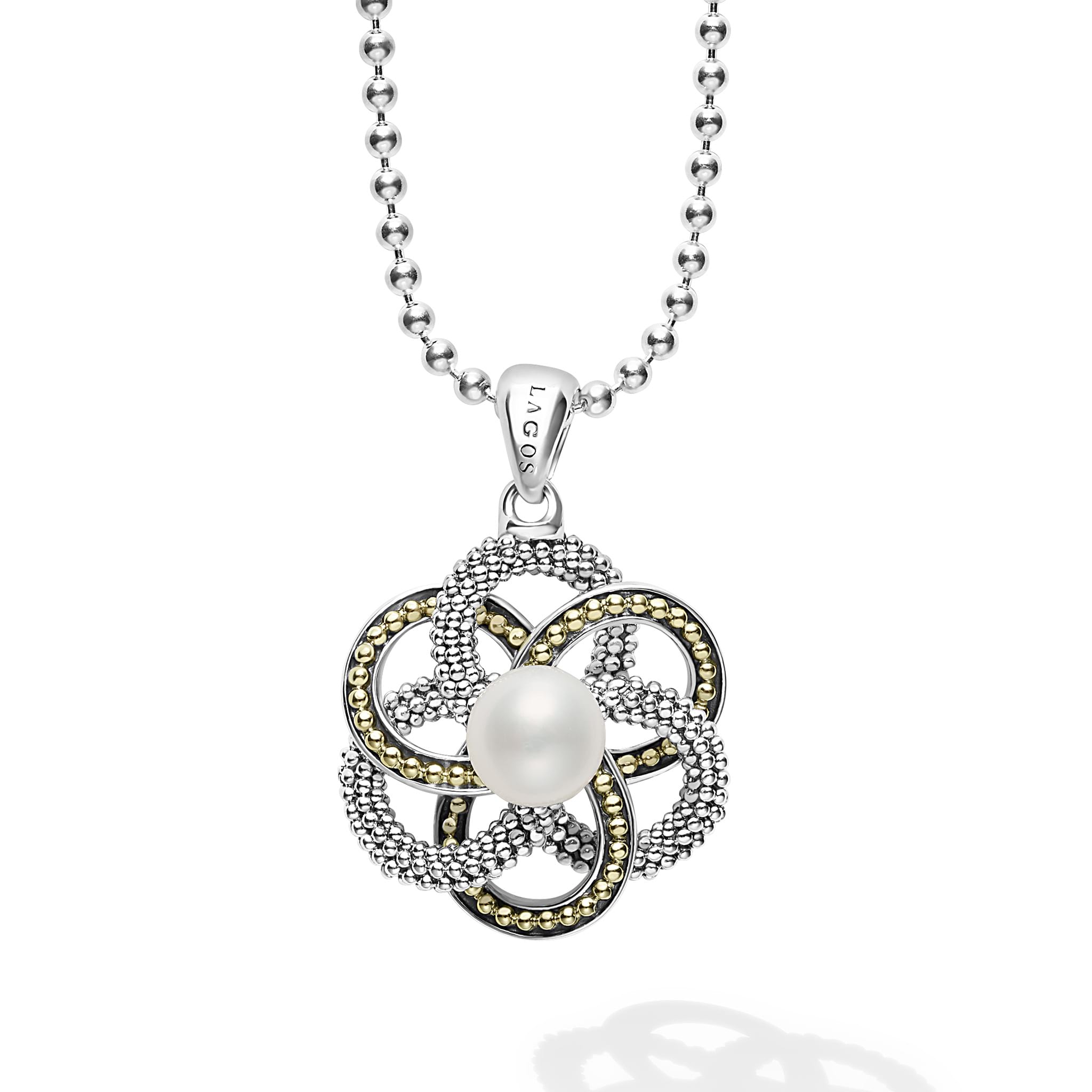 A pearl is the center of this 18k gold and sterling silver Caviar beaded pendant finished on a sterling silver ball chain necklace.