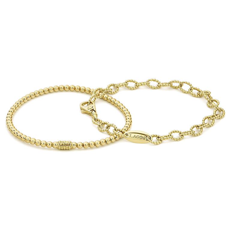 A LAGOS Exclusive. The ideal gift set that includes two 18k gold signature Caviar beaded bracelets.