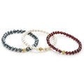 A LAGOS exclusive. This giftable set comes with 3 stackable stretch bracelets with an 18K gold Caviar beaded station.