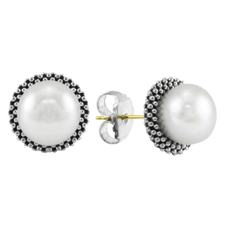 Luna Sterling Silver Pearl Earrings, featuring round pearls in silvery bezels with beaded borders, exemplify LAGOS's elegant craftsmanship and timeless design.