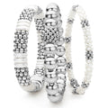 A LAGOS exclusive. Three classic bracelets to layer and make your own. One best-selling sterling silver Caviar stretch bead bracelet. One sterling silver caviar bracelet with smooth white ceramic stations. One white ceramic caviar bracelet accented b