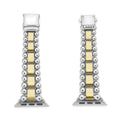 Close-up of Smart Caviar 18K Gold Gift Set's silver watch adapters with gold-tone links, featuring LAGOS logo and signature bead accents.